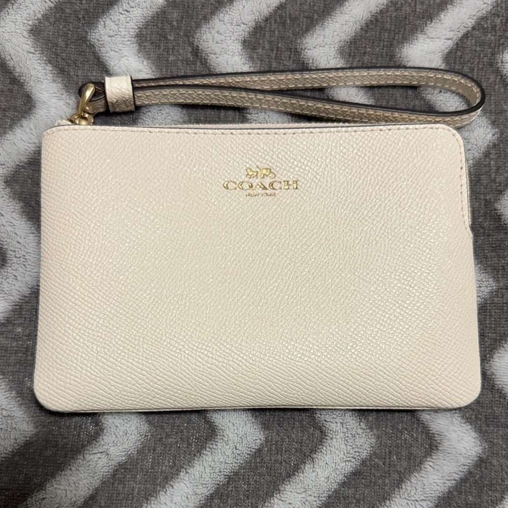 Coach Ivory Wristlet with Gold Accents
